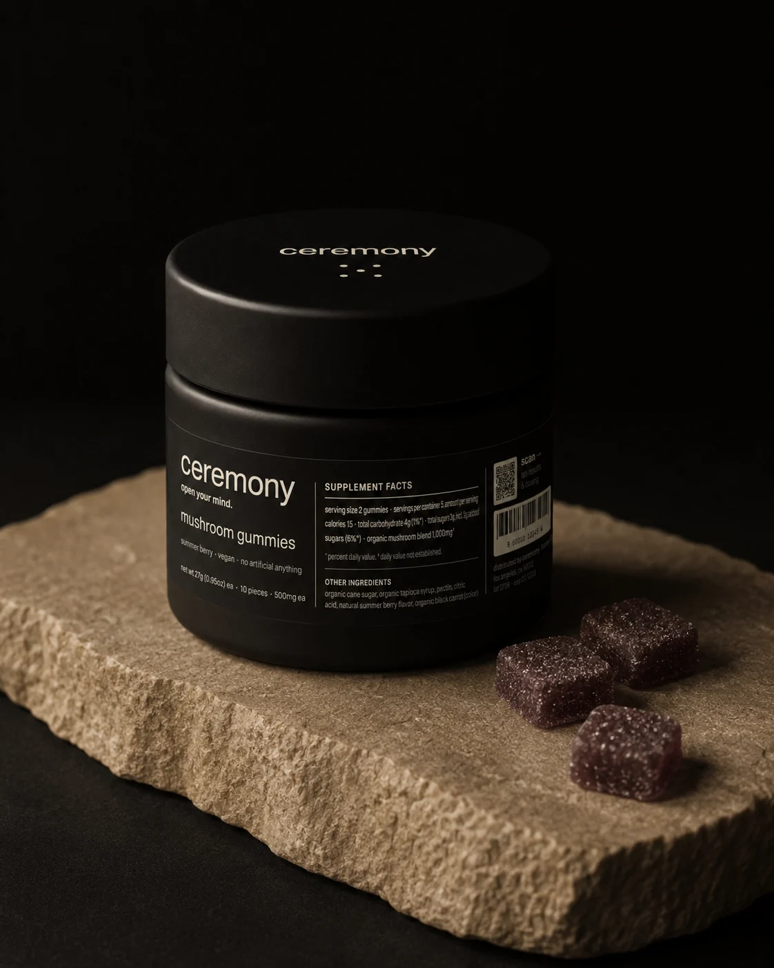 Ceremony jar with berry gummies on a stone slab
